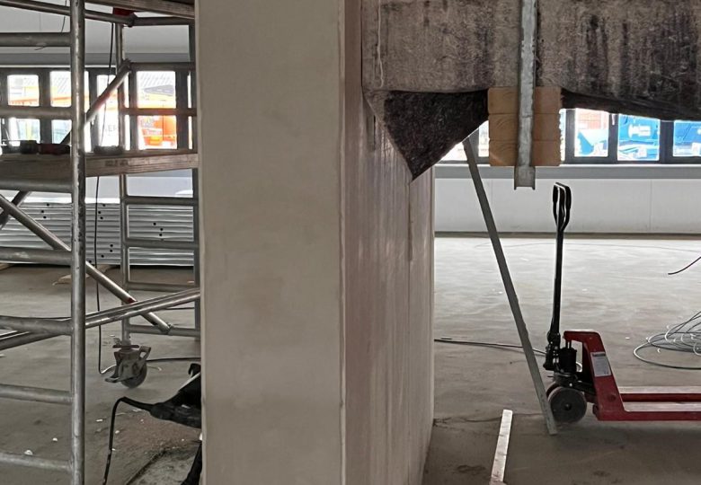 Betonherstelwerk bij de buren